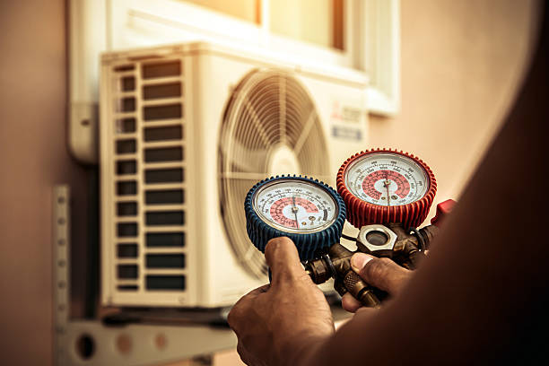 Professional Hvac technician working in Ogilvie, MN